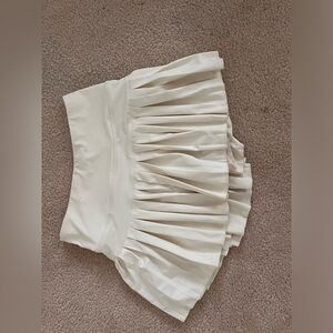 Pale yellow gold hinge skirt. Hardly worn and super trendy!